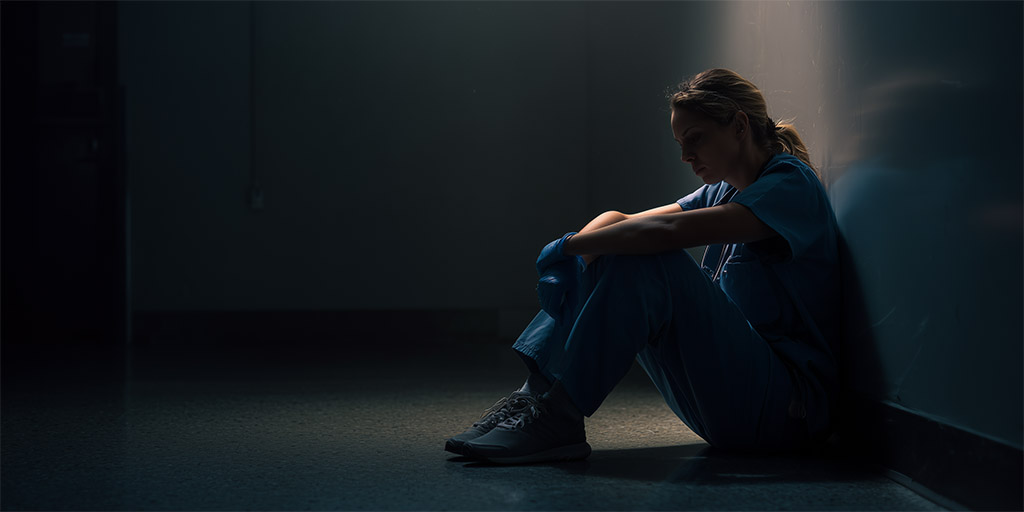 A nurse experiencing emotional conflict